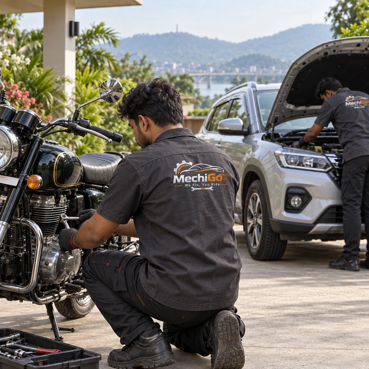 MechiGo mechanics preparing to service a motorcycle and car